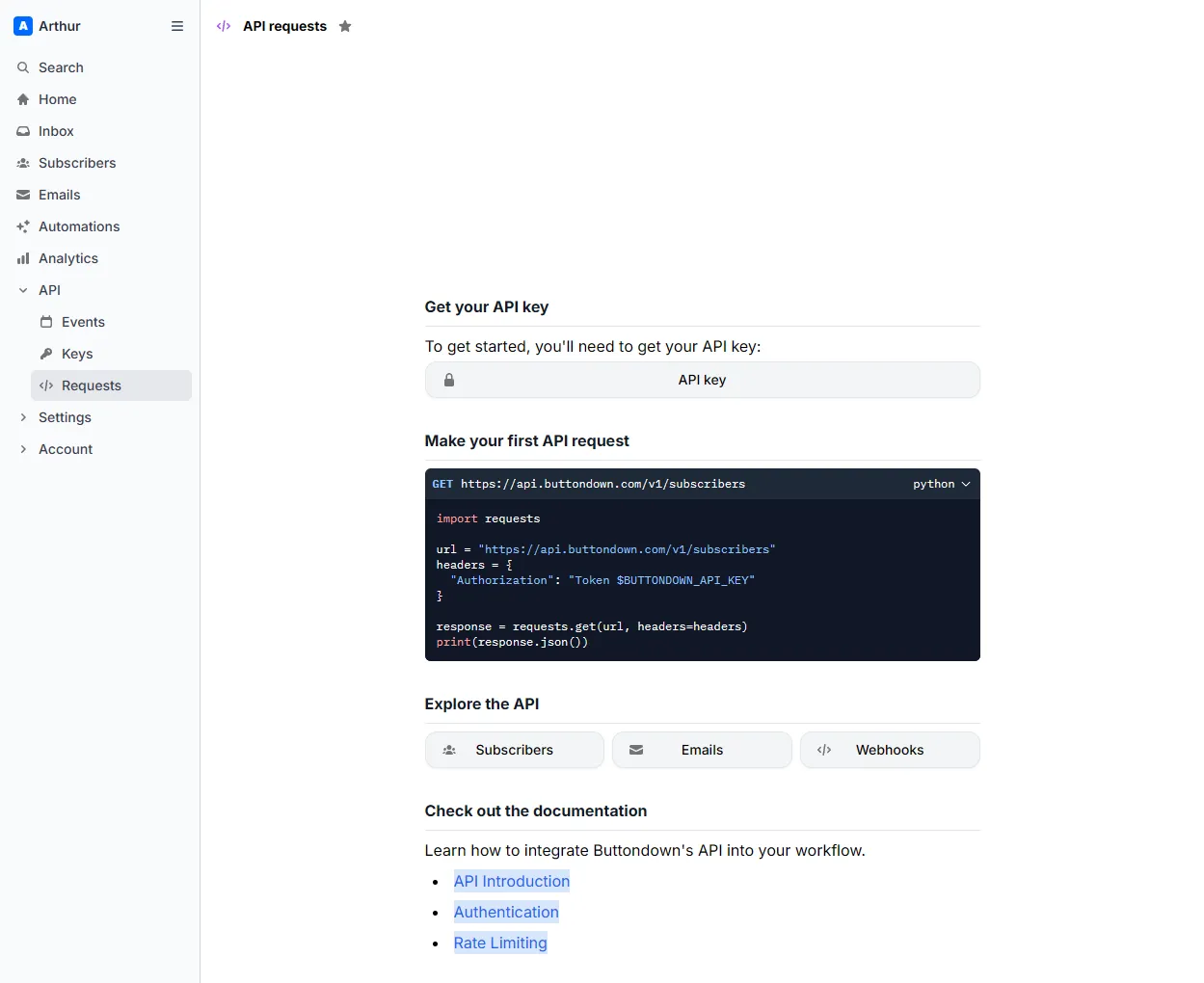 Buttondown's in-app API console showing a key, a sample request and webhooks
